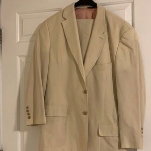 cream colored, looks brand new suit